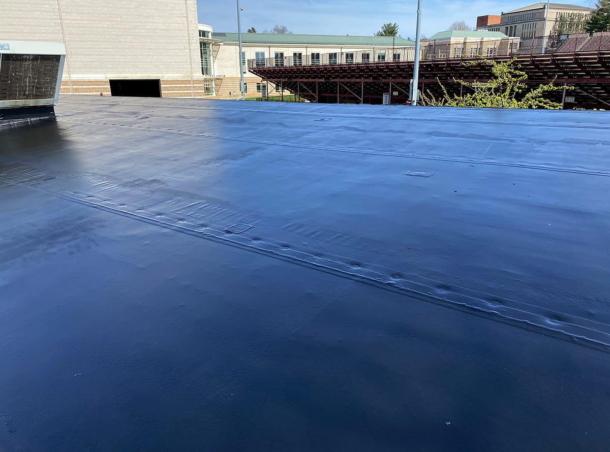 AP-6100 EPDM Stadium Roof Restoration with Black Modified Rubber Roof Coating View 2