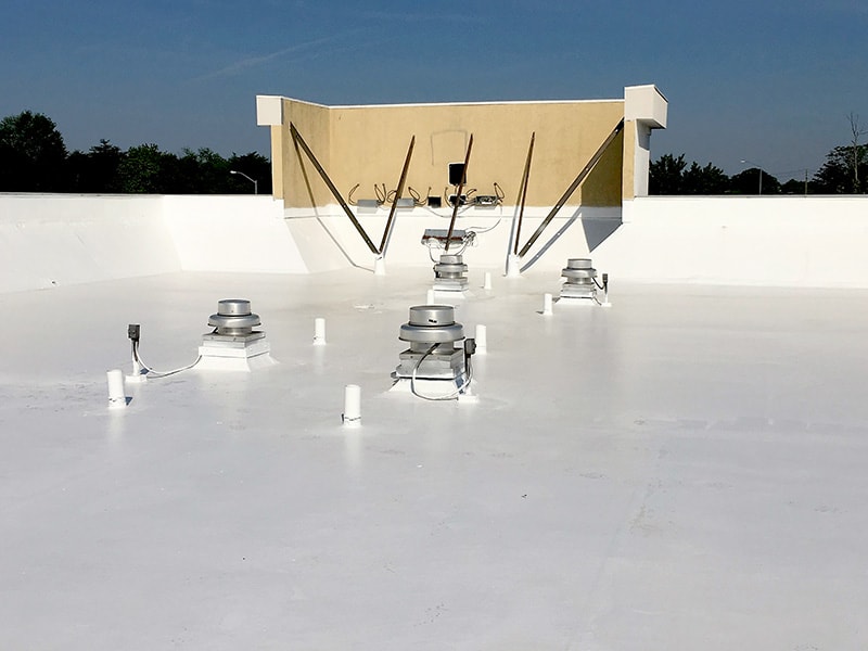 Ballasted Roof Silicone Coating Completed