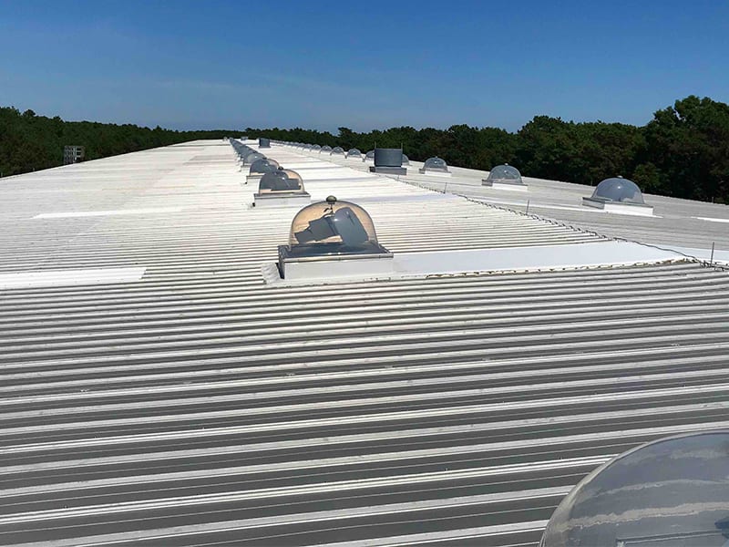 Paving Research Center Metal Roof Before Overview