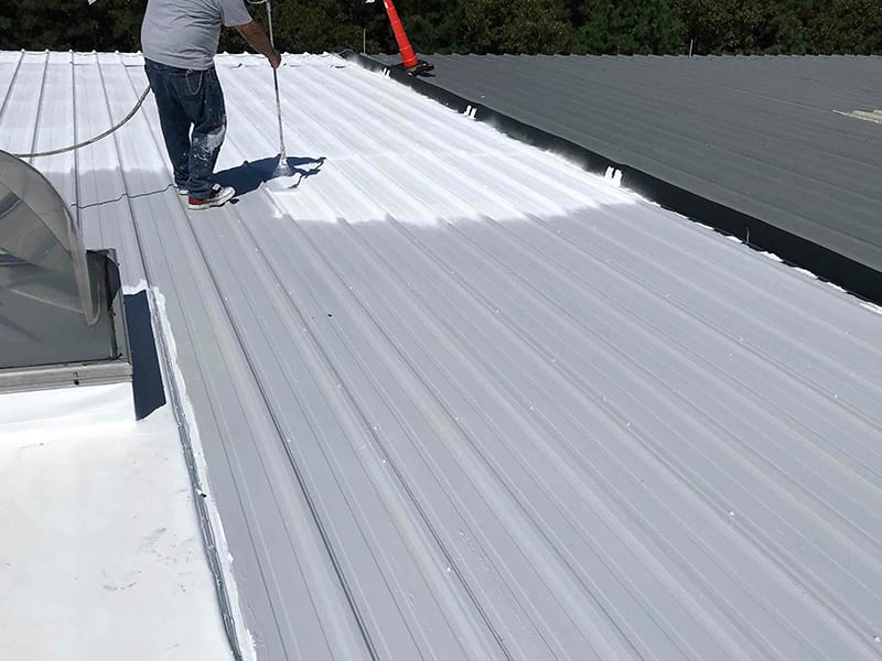 Paving Research Center Metal Roof Restoration with AP-3200 Acrylic Finish Coating Spray Application