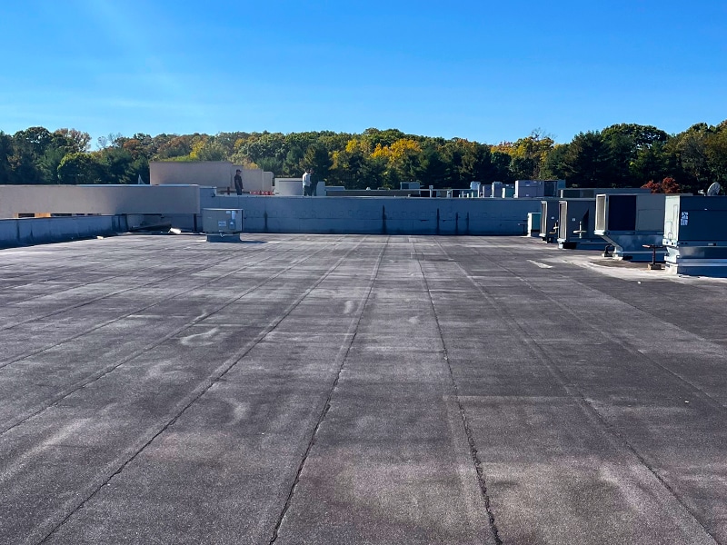 Image of Deptford Shopping Center Deptford, NJ - AP-5100 Moisture Cure Polyurethane Asphalt Roof Before Photo from Roof Level