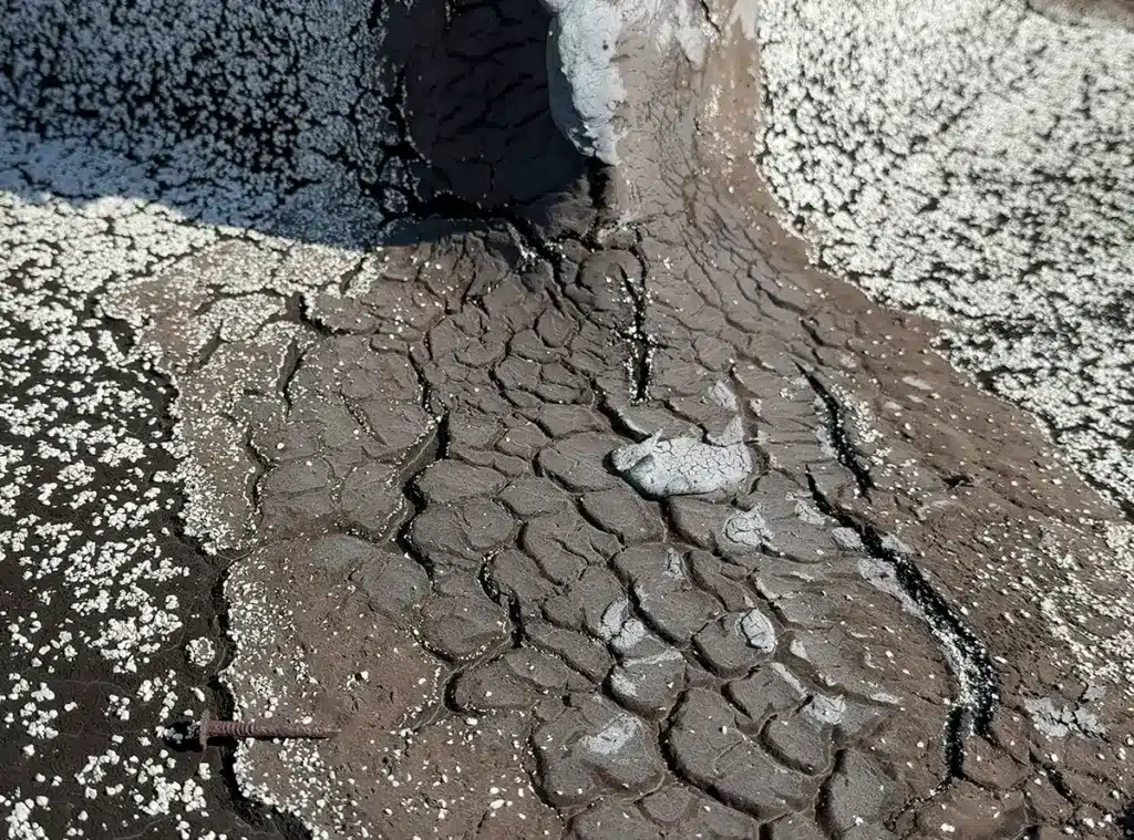Dried and Cracking Roof Membrane at Corner Wall Flashing